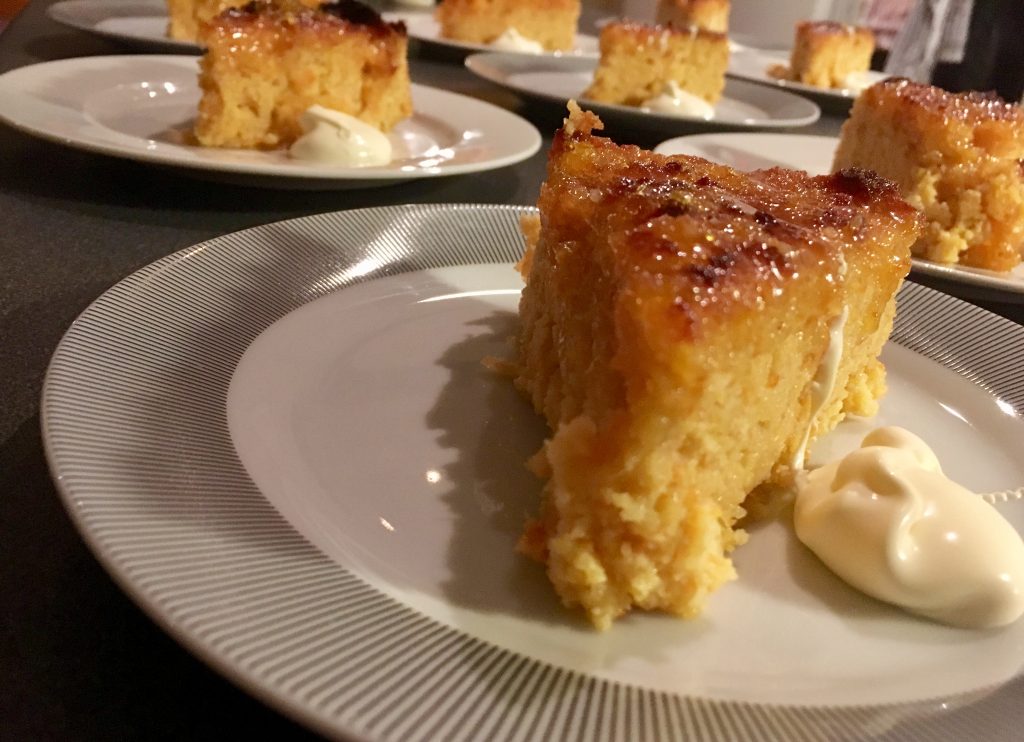 pieces of cake on a plate with cream